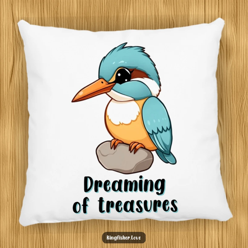 Funny pillow depicting a kingfisher holding a shiny pebble in its beak, head tilted curiously, for cozy, whimsical humor.